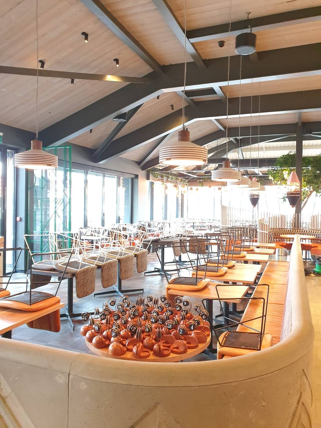 Restaurant seating area with polished tables after a deep clean