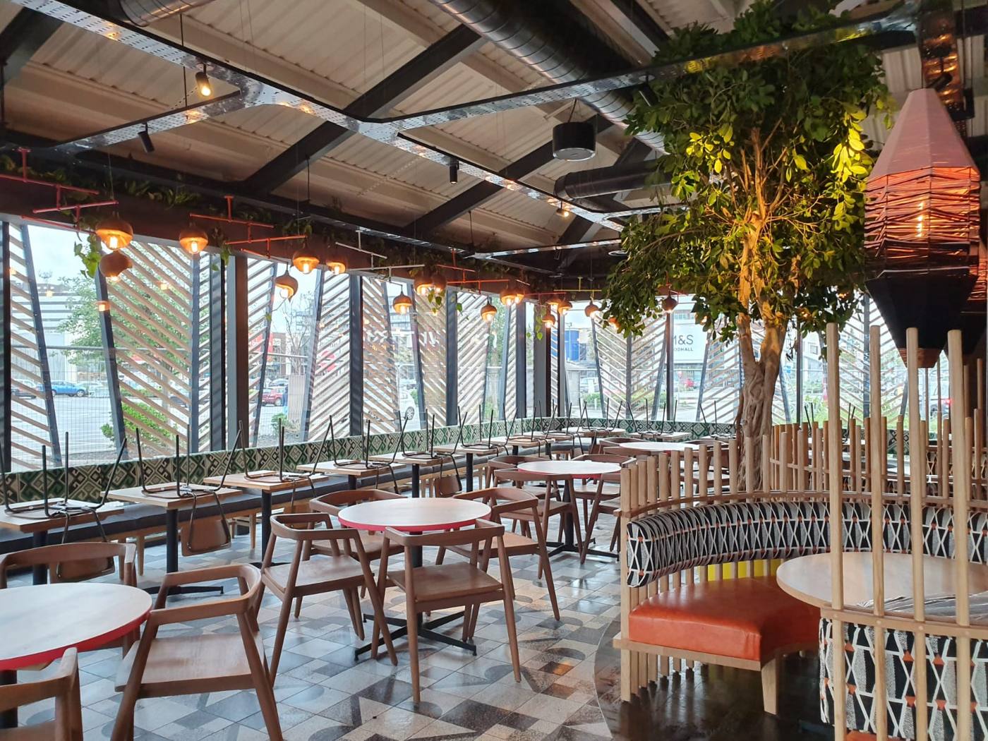 Restaurant interior with pendant lighting cleaned and ready for service
